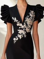 Charming Black Chiffon Dress with Beige Floral Motif and Ruffled Sleeves