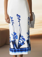 Sleek Sleeveless Satin Dress with Bold Blue Botanical Print