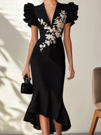 Charming Black Chiffon Dress with Beige Floral Motif and Ruffled Sleeves