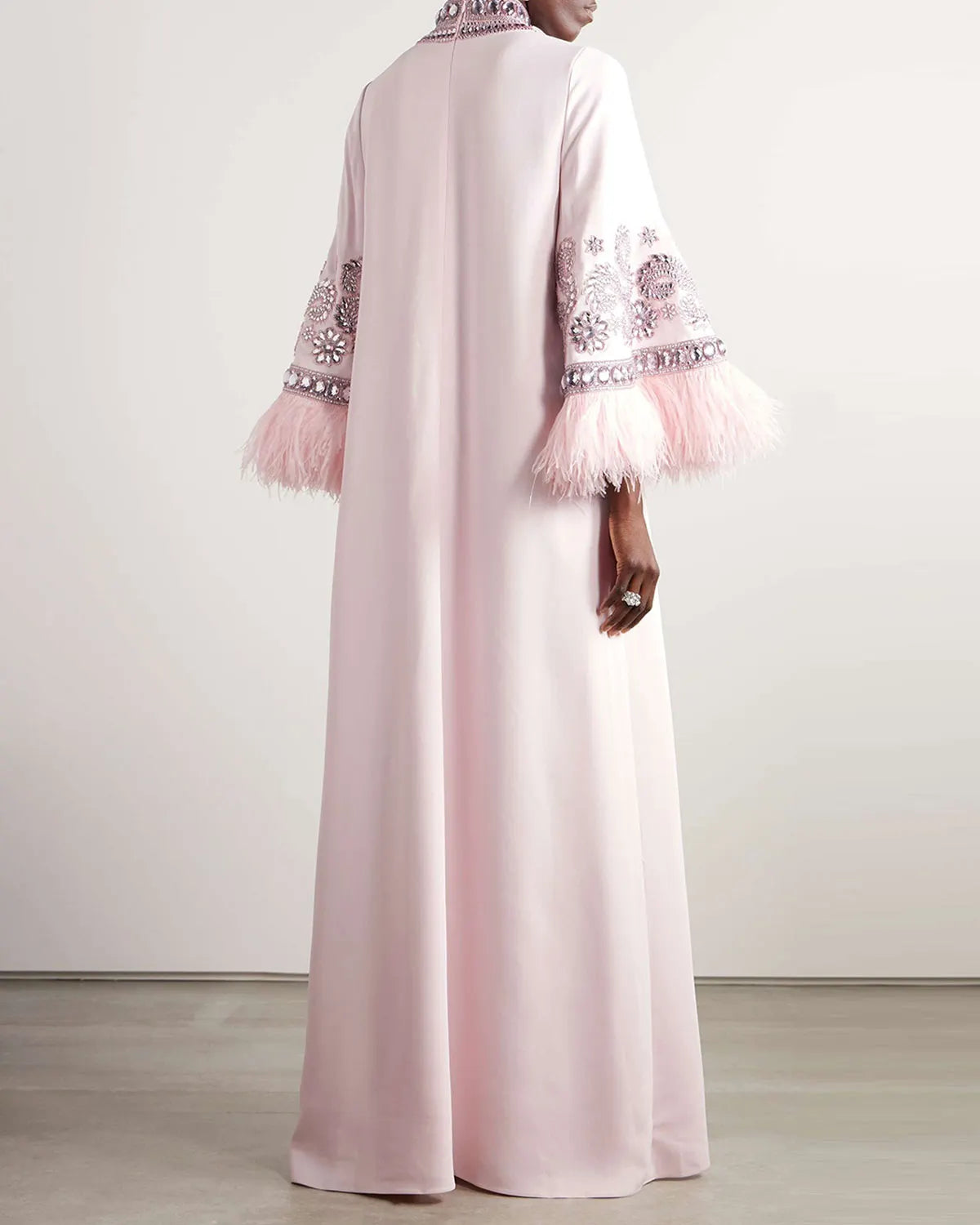 Feather-trimmed crystal-embellished crepe turtleneck gown