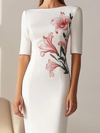 Chic White Midi Dress with Side Floral Embellishment